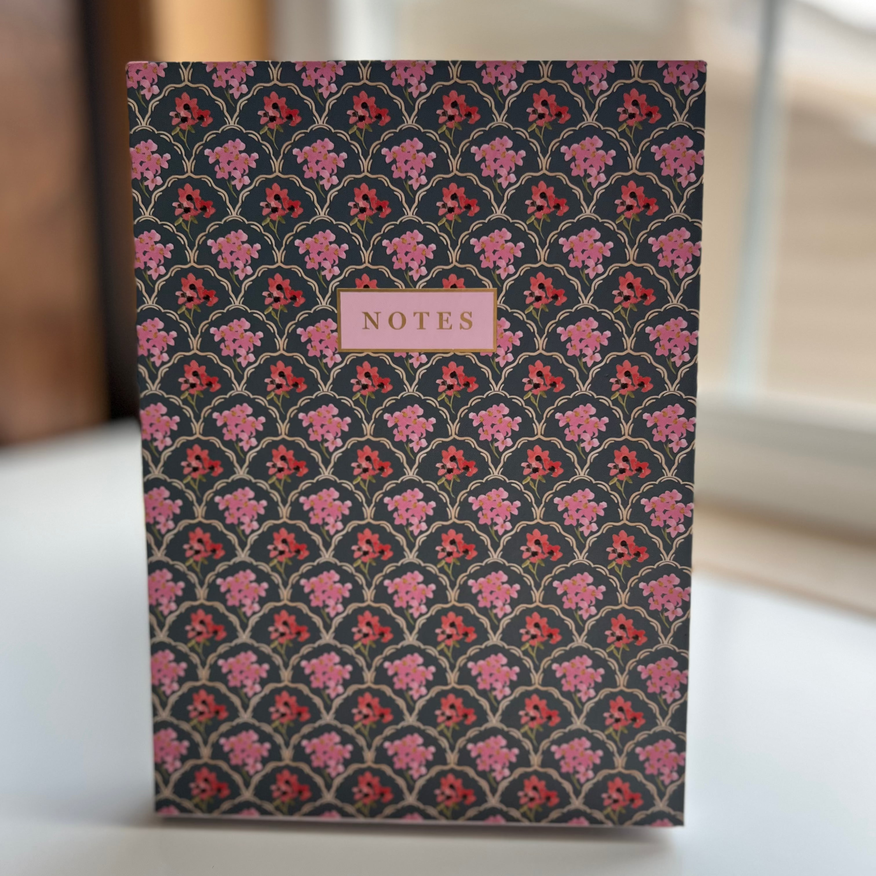 Large Notebook With a Golden Pen