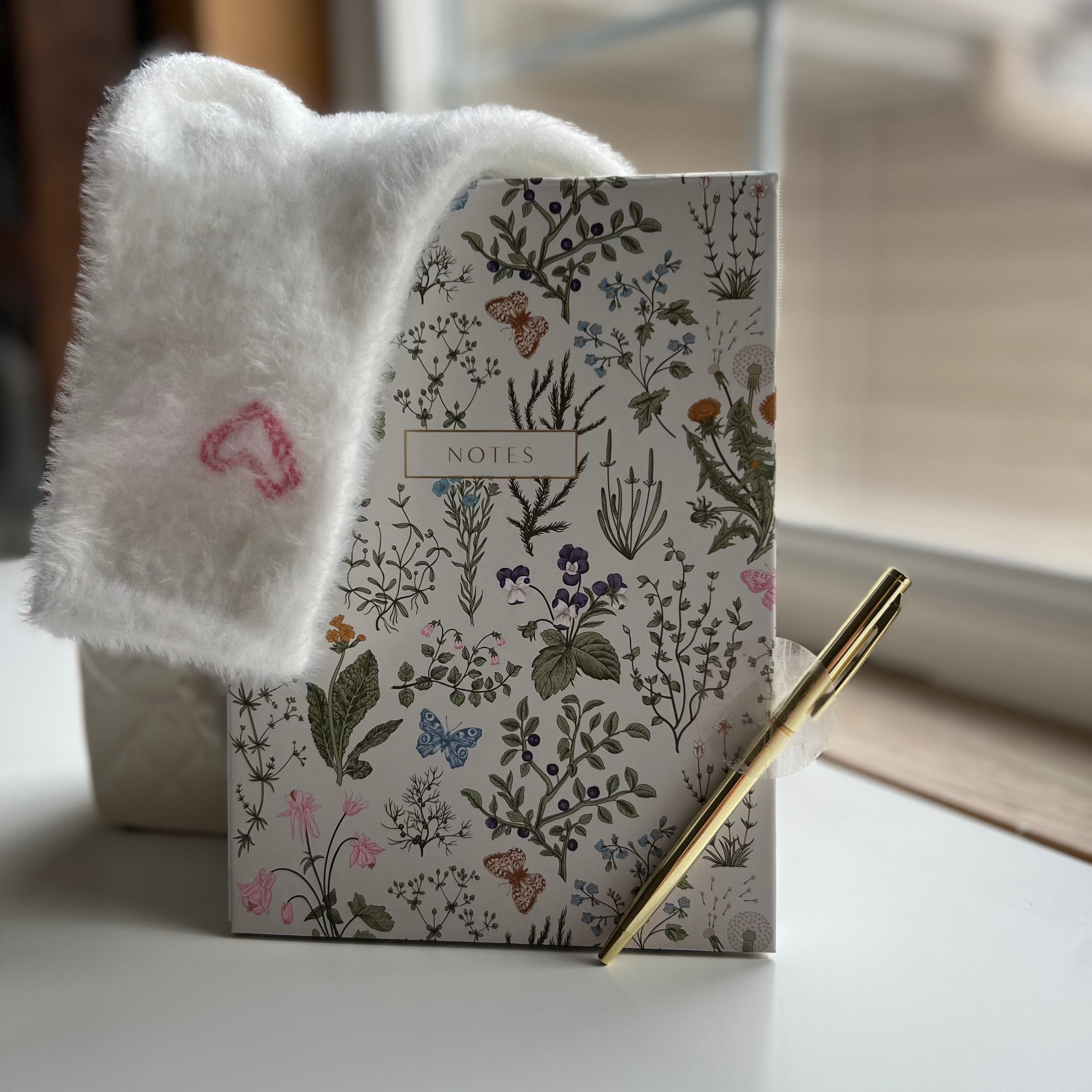 Large Notebook With a Golden Pen